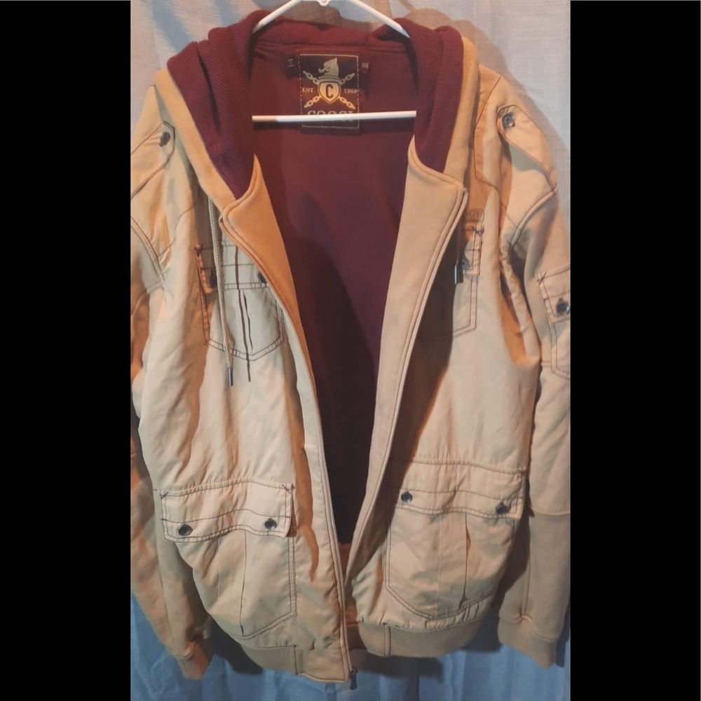 Men’s coogi jacket slight damage priced according